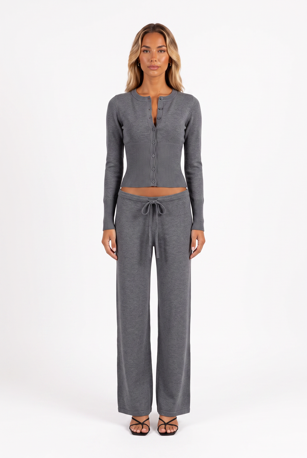 Dark grey knit cardigan and low-rise drawstring trouser set — front