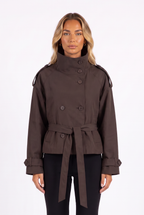 Brown cropped double-breasted belted trench jacket — collar, buttons and belt detail