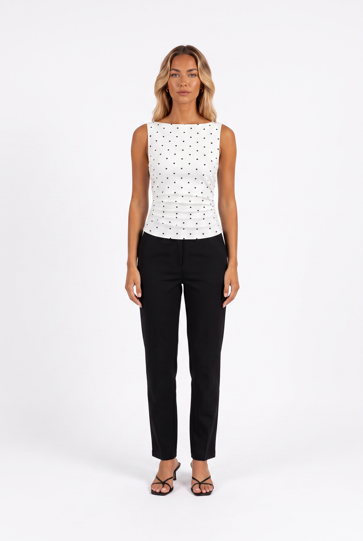 White polka-dot boat-neck sleeveless top with tie back — front