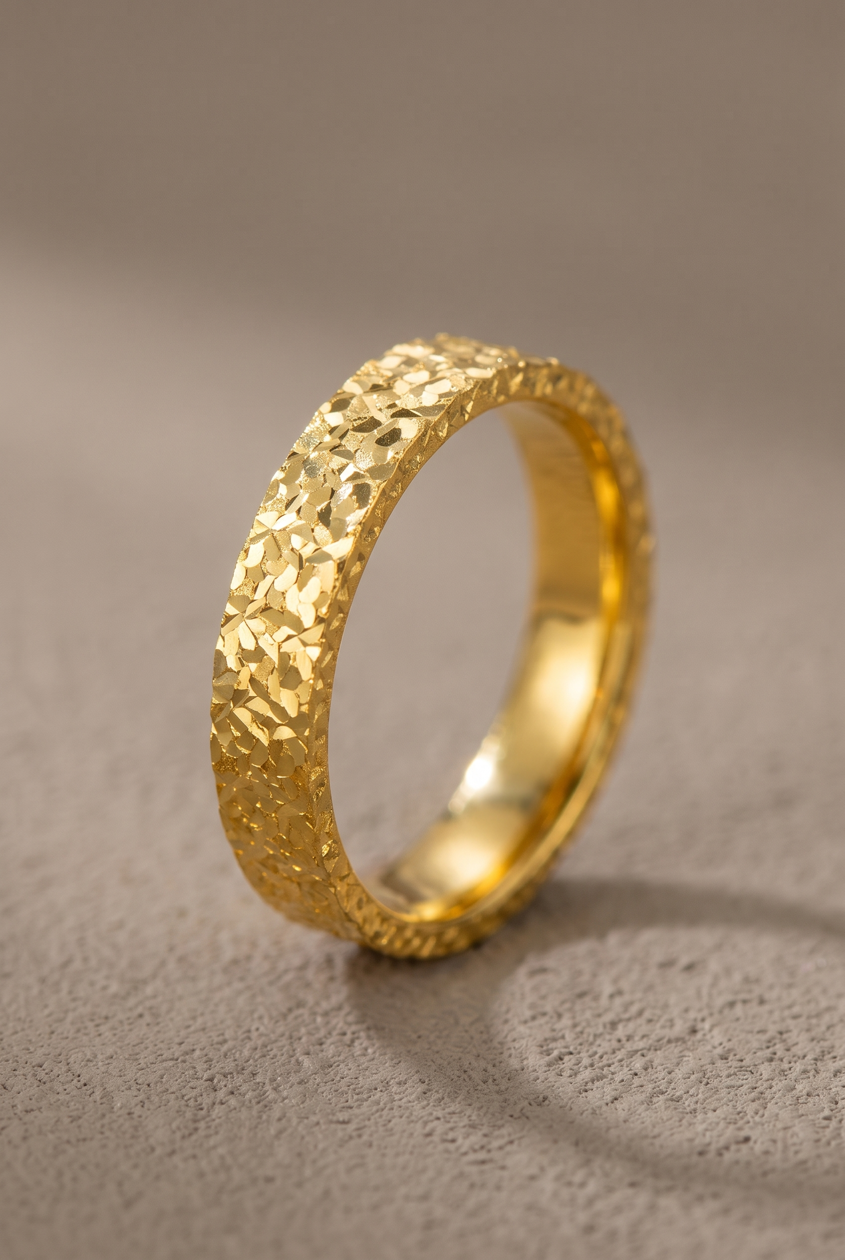 Close-up of the faceted star-cut texture of the band